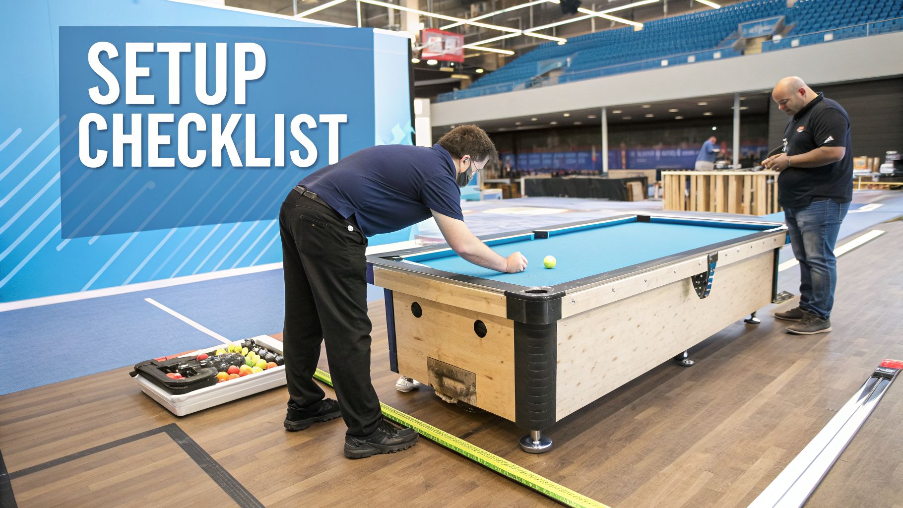 Two men setting up a blue-felt pool table in a large hall for an event, with a "SETUP CHECKLIST" graphic.