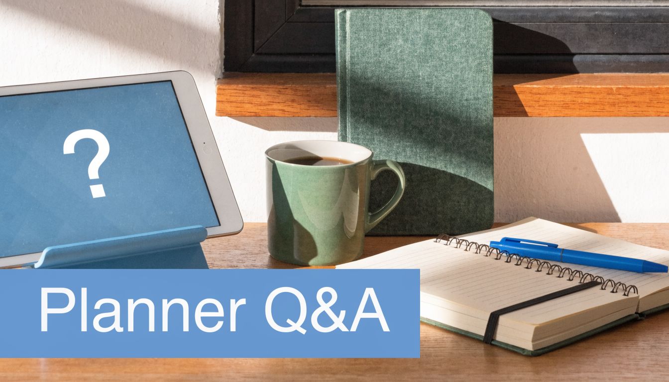 A digital tablet with a question mark next to a coffee mug and a planner on a desk.