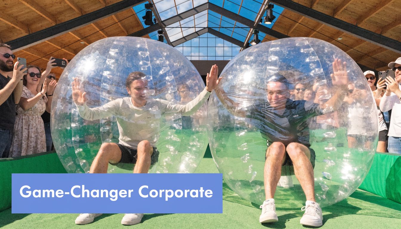 Two people wearing human hamster balls high-five each other while playing a fun corporate team building game.