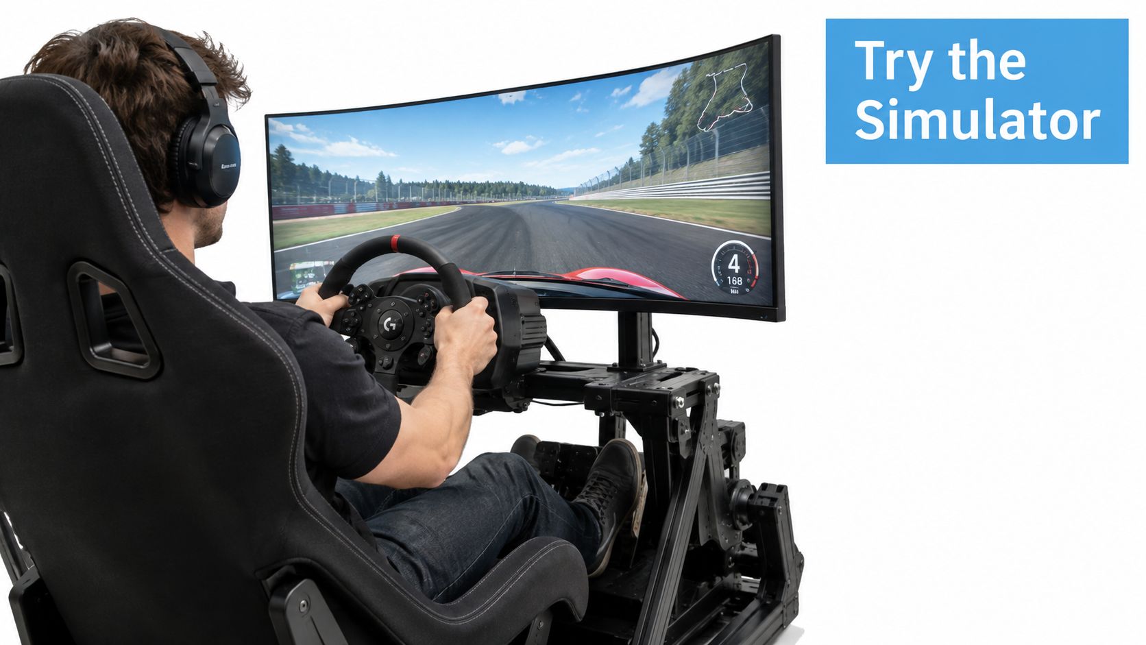 A person wearing headphones while using a professional racing simulator setup with a curved screen display.
