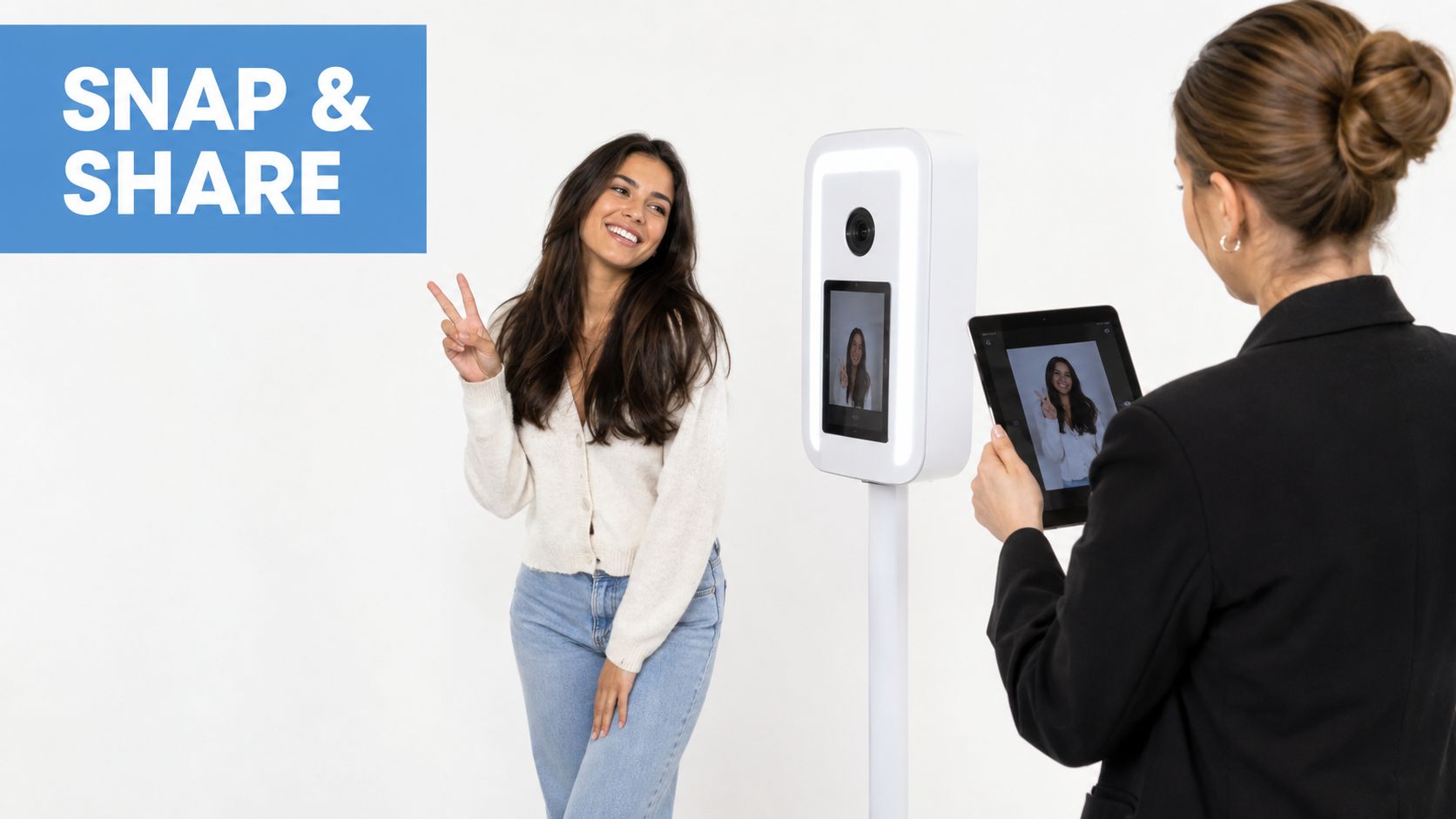 A woman takes a photo at a portable event photo booth while a staff member holds a tablet.