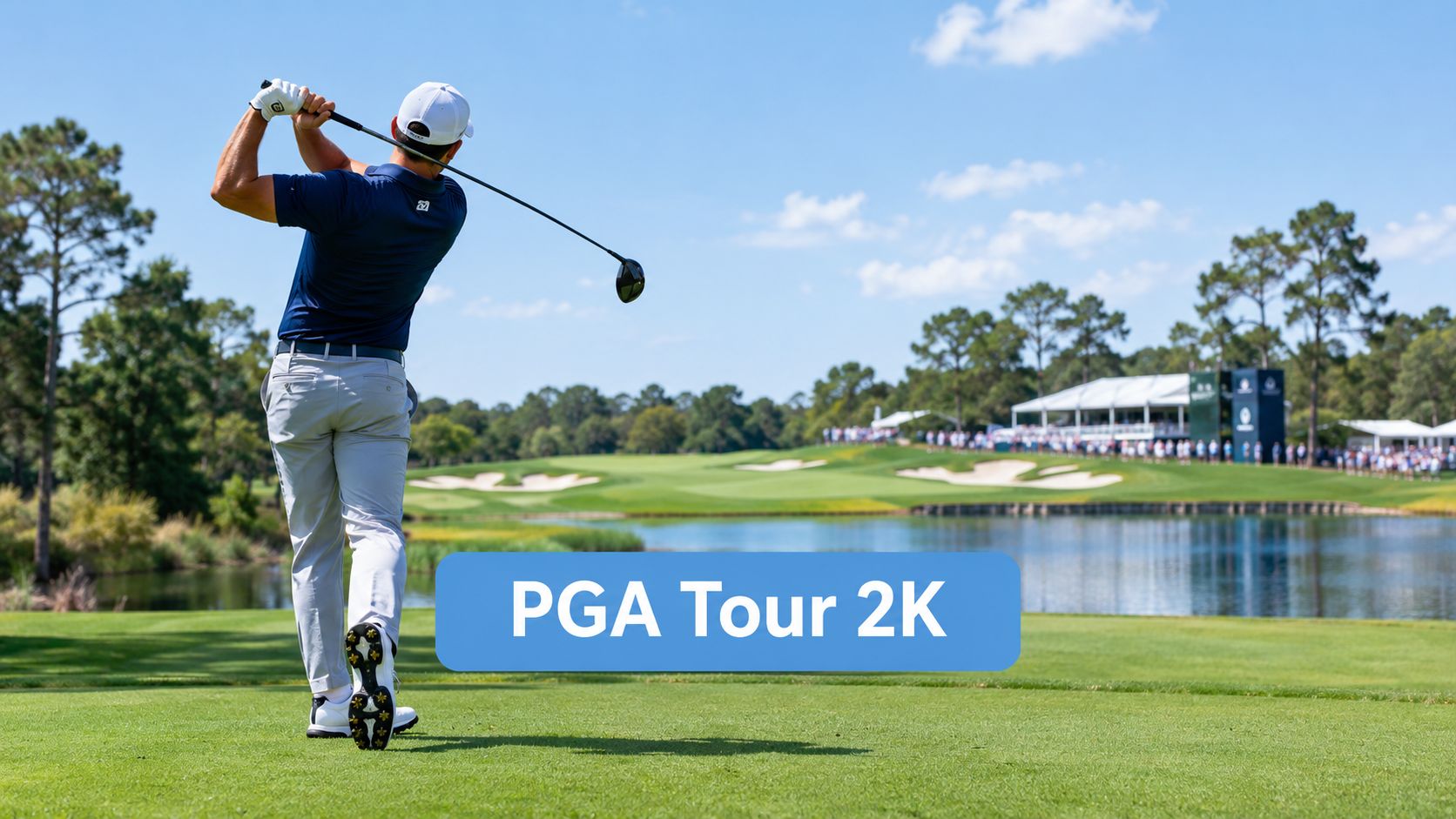 A professional golfer in a navy shirt and gray pants finishes a swing on a sunny golf course.