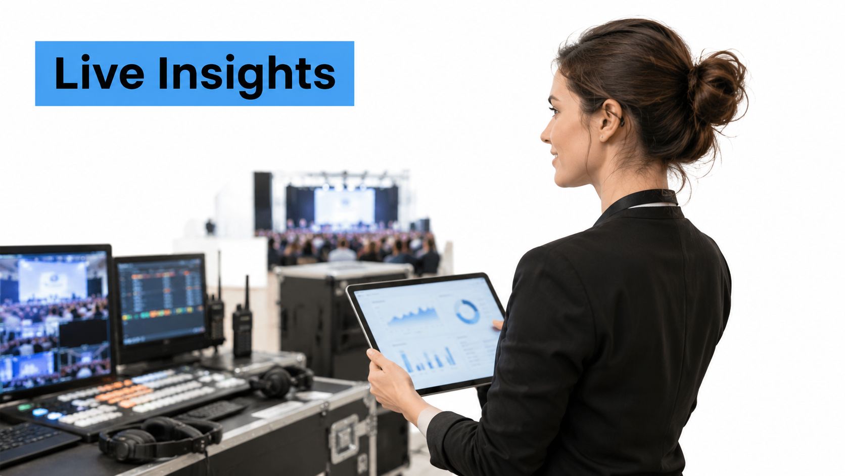 A professional woman in a suit using a tablet for live event monitoring and data analysis.
