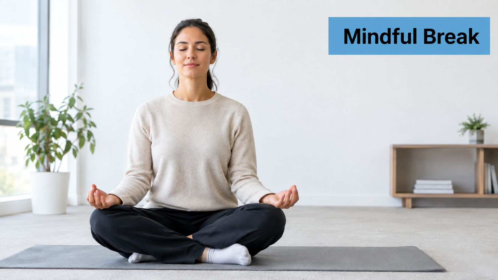 A young woman sitting in a lotus position on a yoga mat practicing mindfulness for relaxation.